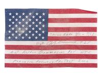 [FLAGS]. A group of items related to the recovery efforts at Ground Zero after September 11, 2011, incl. a helmet worn at the site by retired NYC Detective Arthur Giammarino as he assisted in the recovery efforts.