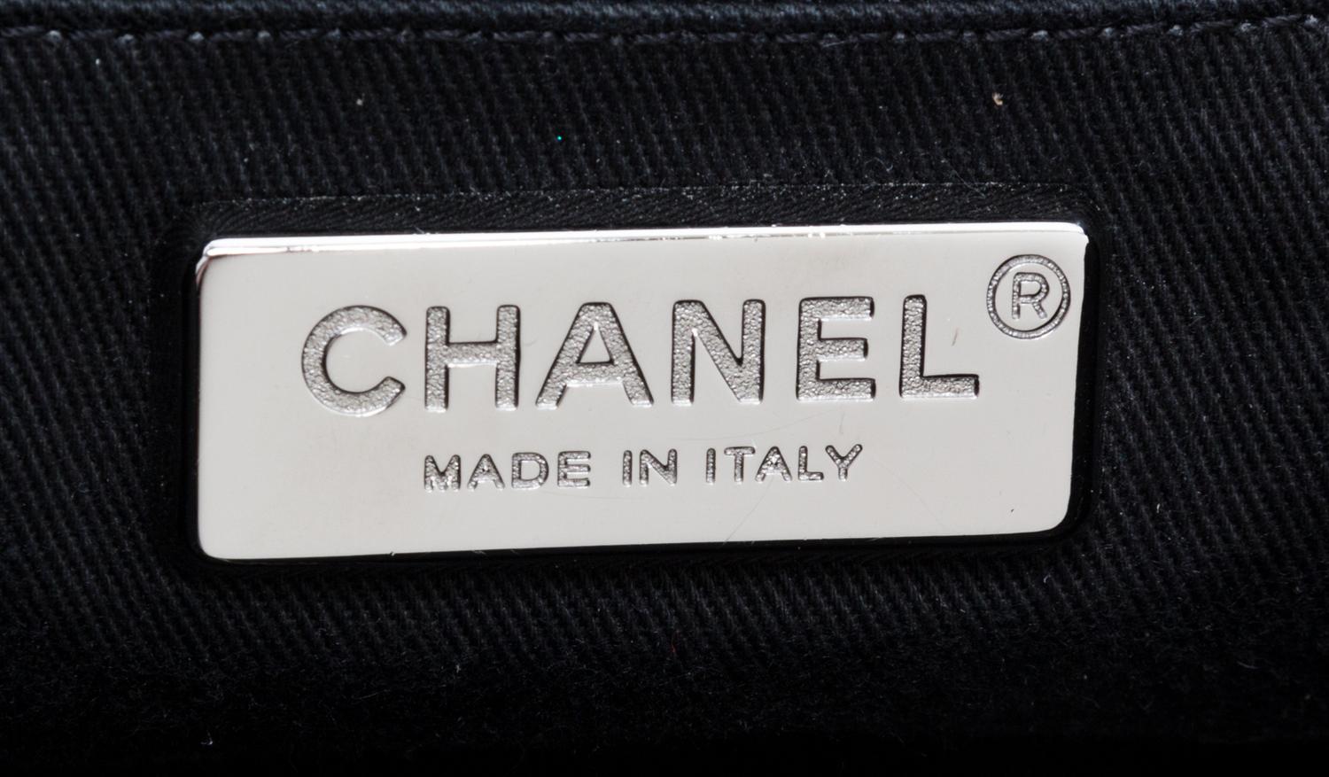 A Chanel Black Pony Hair Drawstring Tote Bag, 14" x 9" x 5".