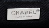 A Chanel Black Pony Hair Drawstring Tote Bag, 14" x 9" x 5".