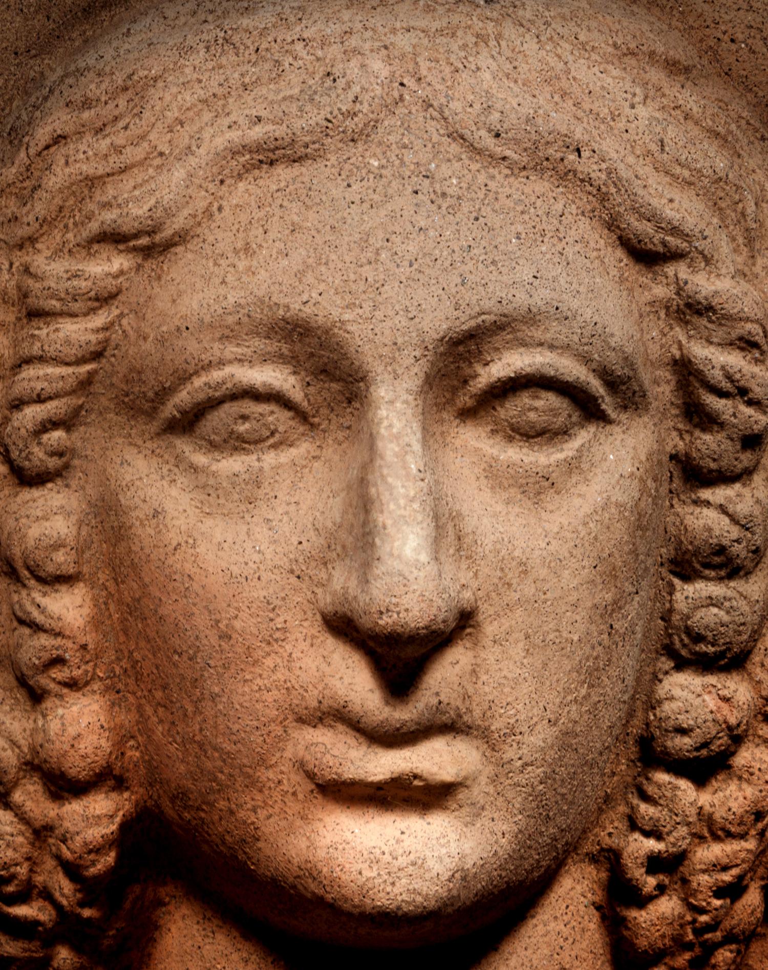 An Etruscan Terracotta Votive Head of a Woman