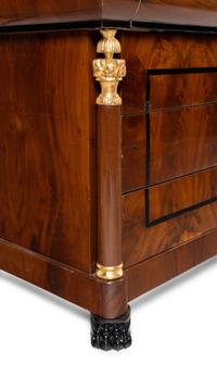 A Pair of German Neoclassical Mahogany and Parcel-Gilt Commodes