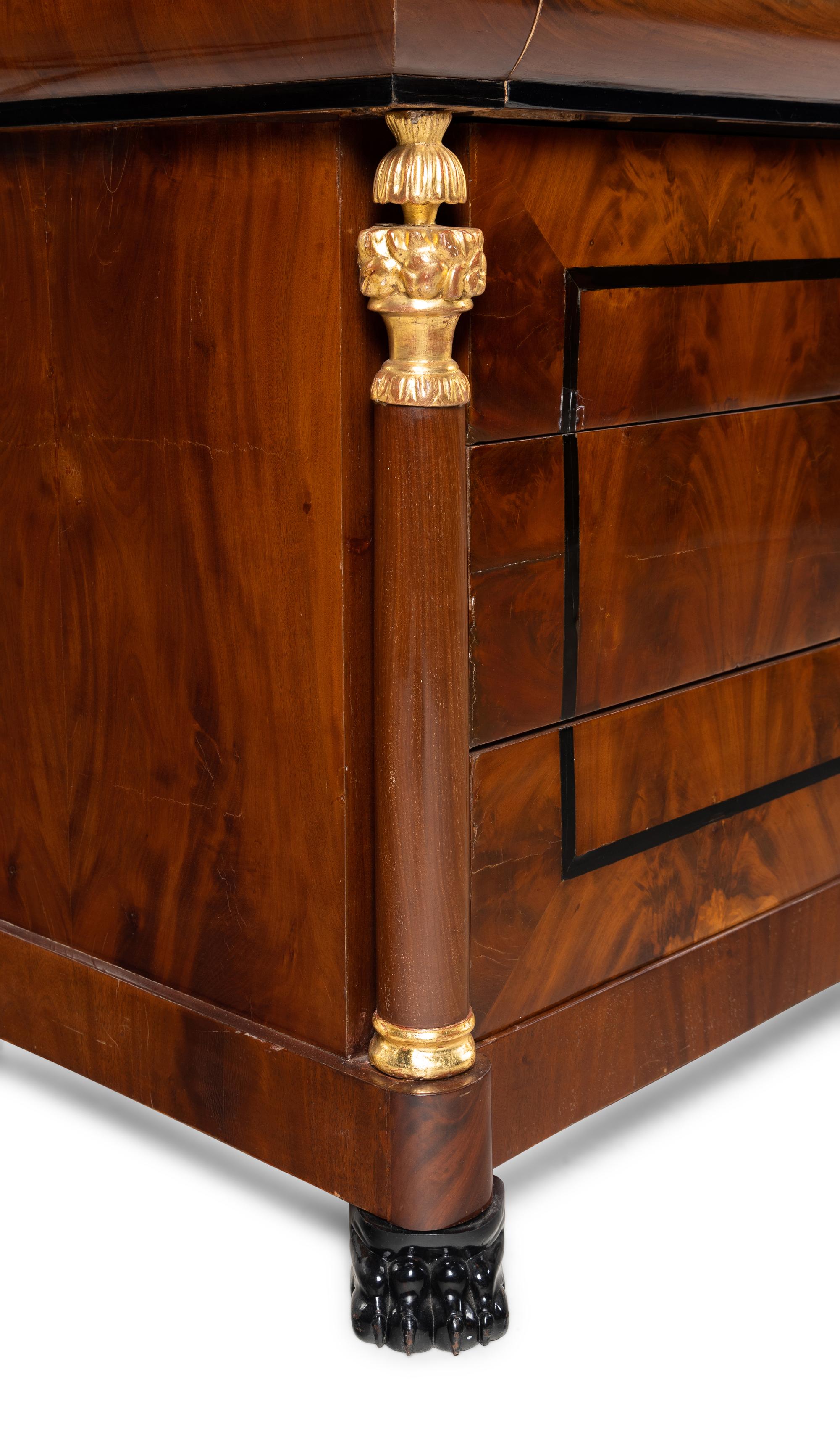 A Pair of German Neoclassical Mahogany and Parcel-Gilt Commodes
