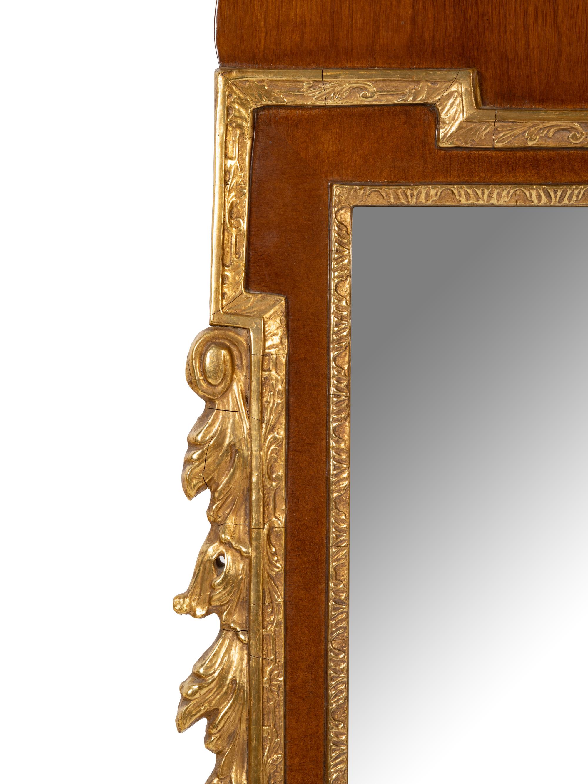 A George II Style Parcel Gilt Mahogany Mirror