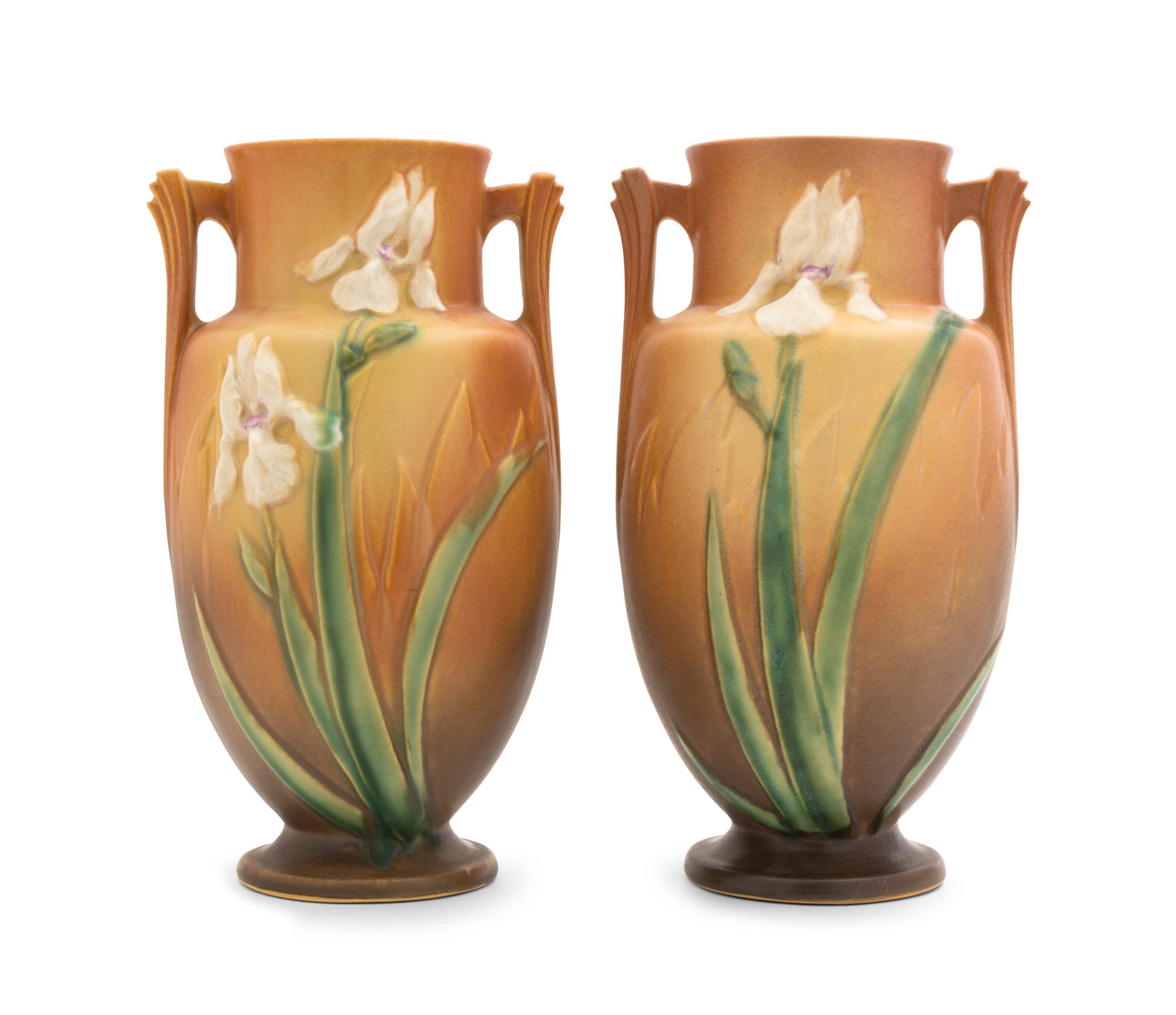 A Pair of Roseville Iris Pottery Vases Height 12 1/4 inches.