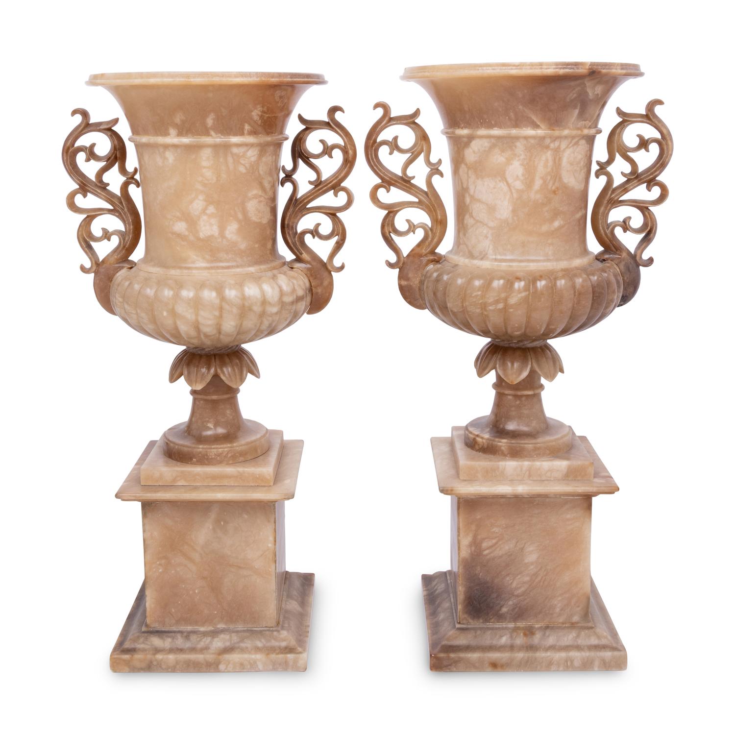 A Pair of Carved Alabaster Urns