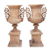 A Pair of Carved Alabaster Urns
