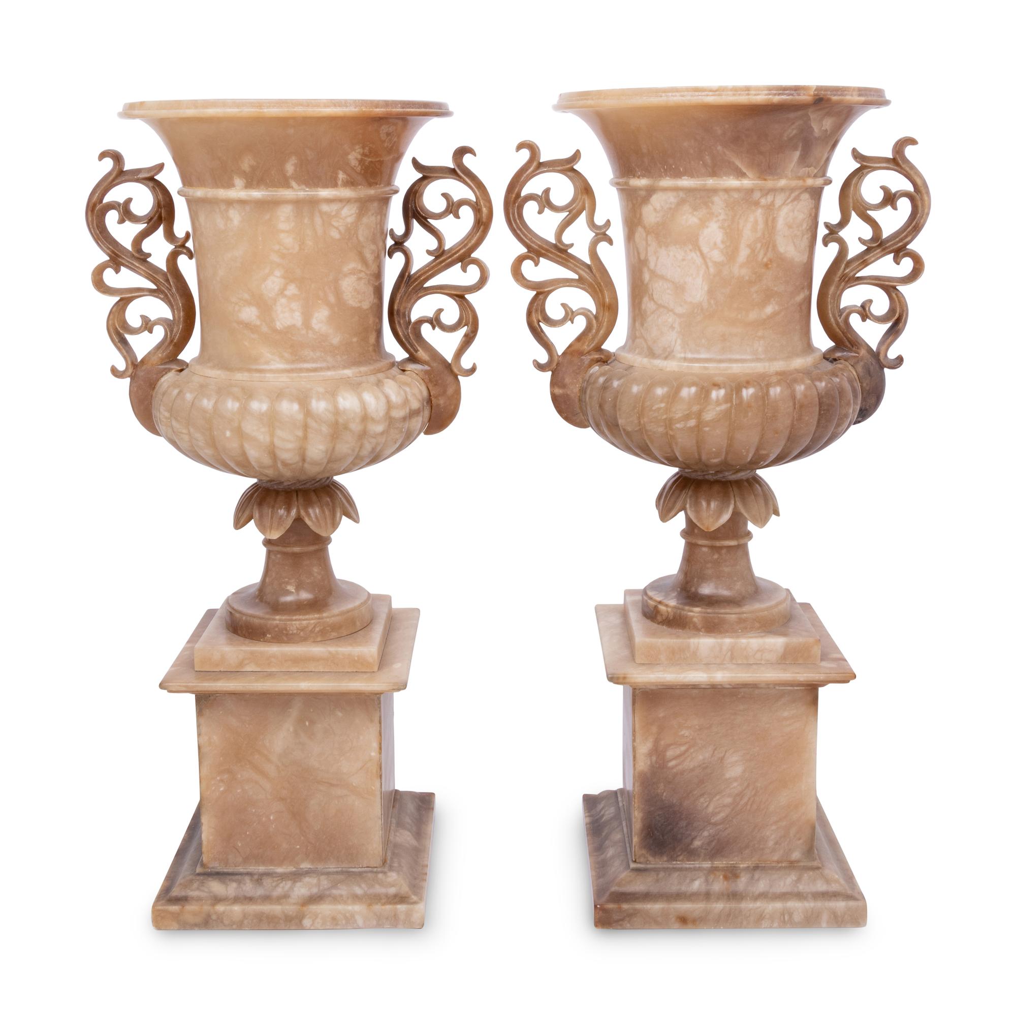 A Pair of Carved Alabaster Urns