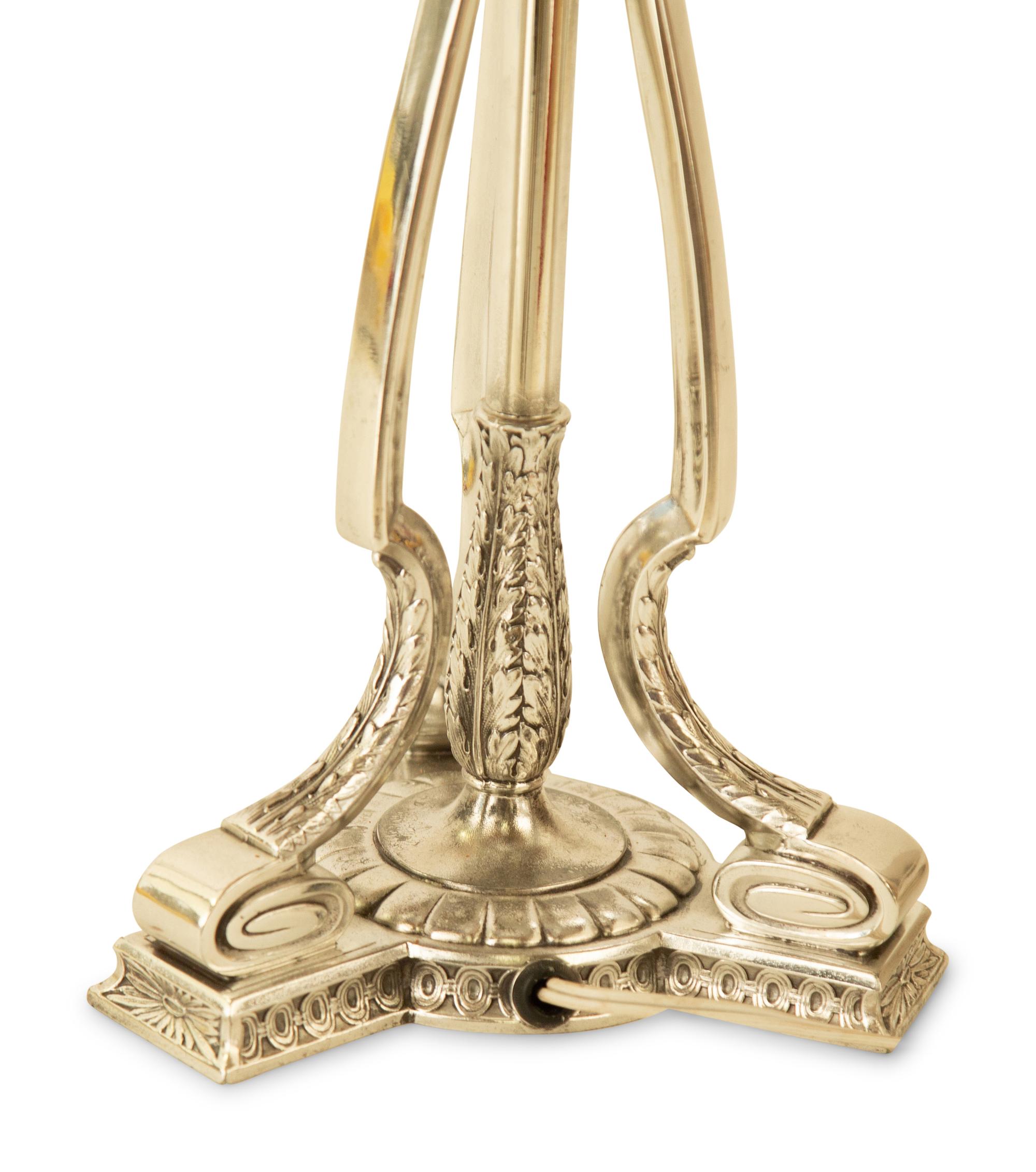 A Silver-Plate Table Lamp with a Reverse-Painted Glass Shade