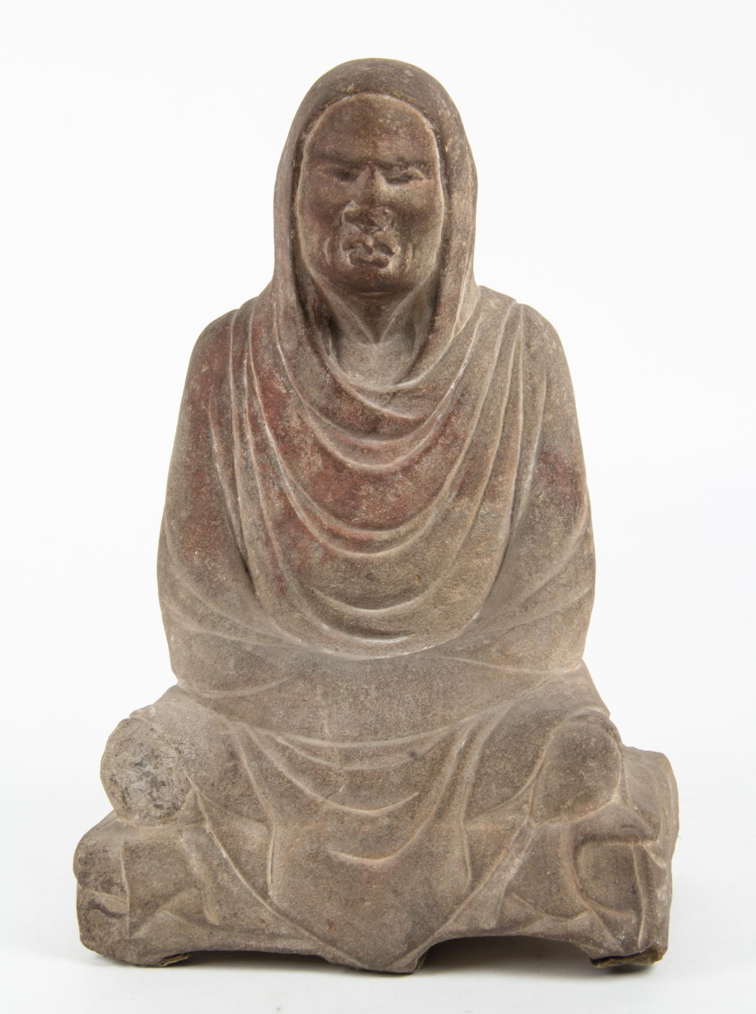 A Carved Stone Figure Height 14 3/4 inches. — 20TH CENTURY