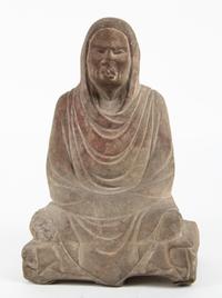 A Carved Stone Figure Height 14 3/4 inches. — 20TH CENTURY