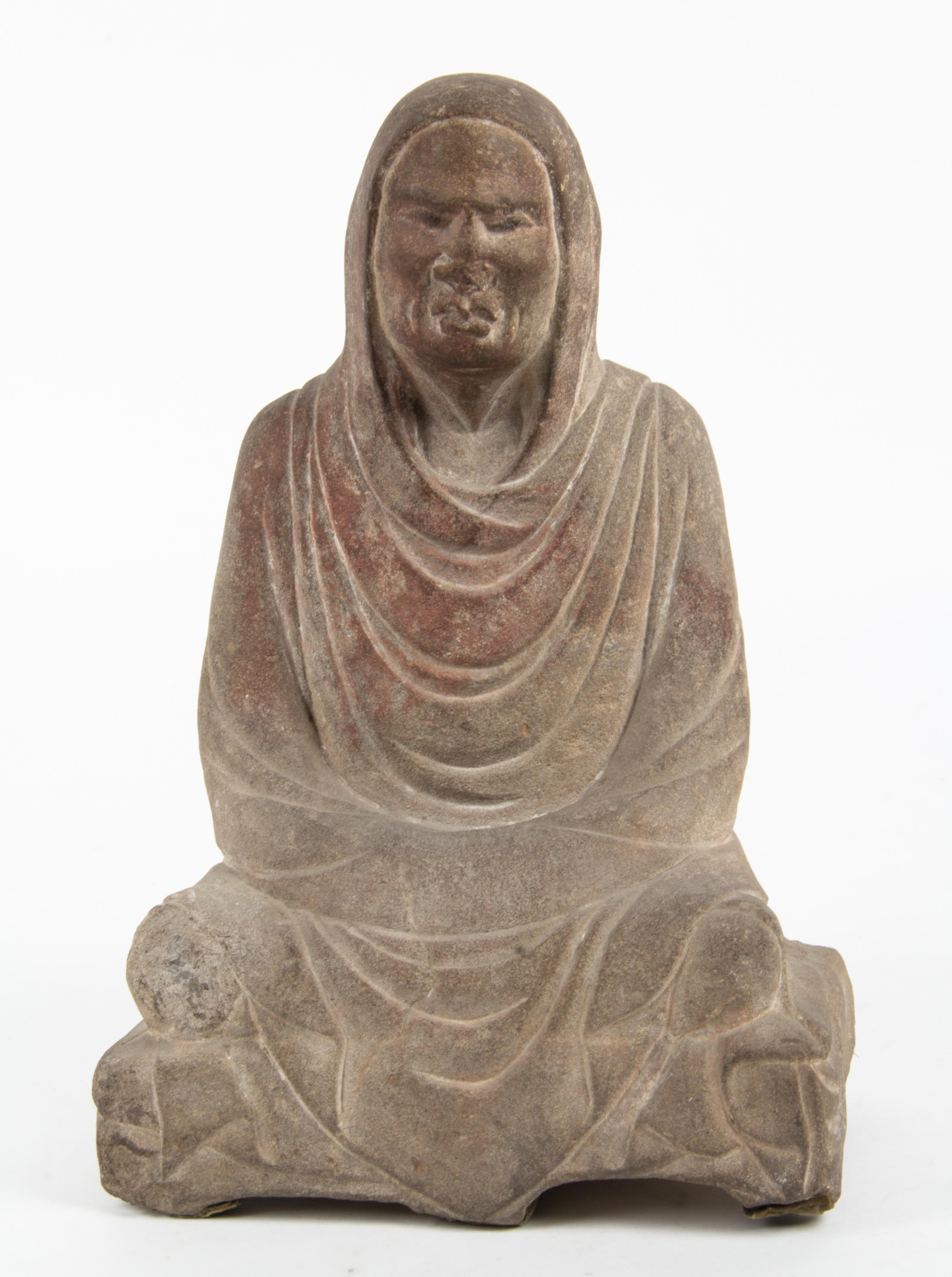 A Carved Stone Figure Height 14 3/4 inches. — 20TH CENTURY