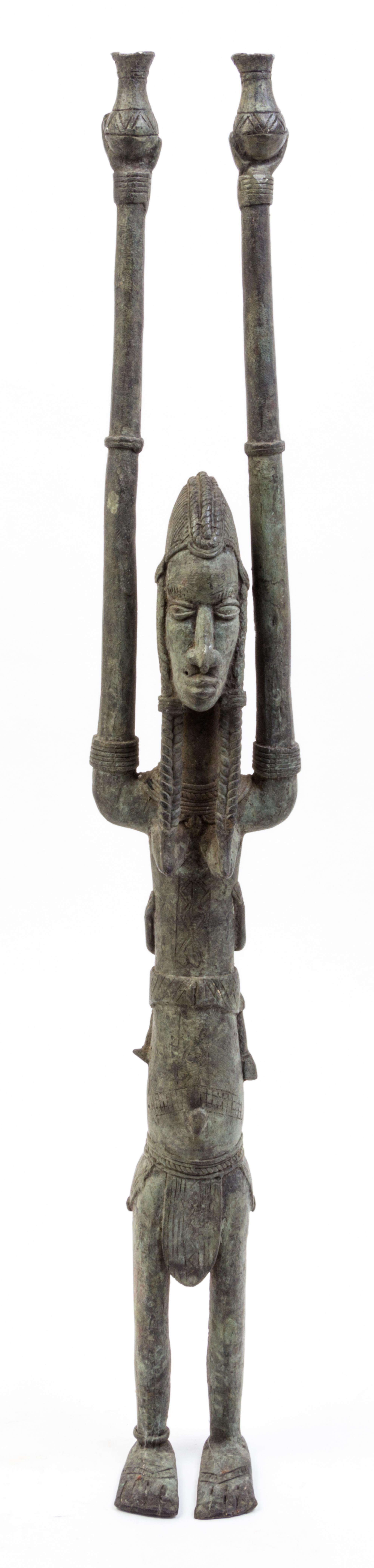 An African Cast Metal Maternity Figure Height 27 1/8 inches.