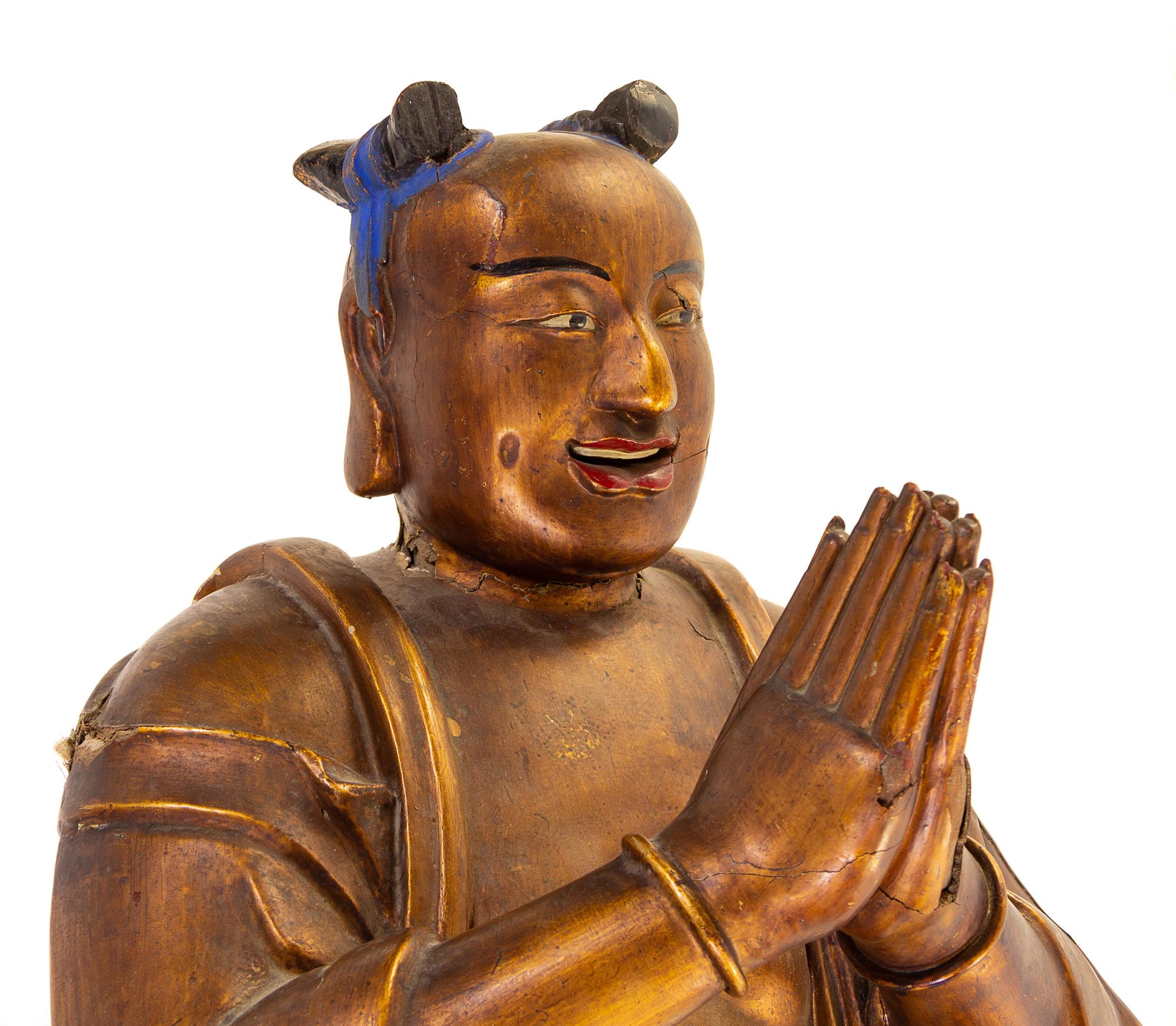 A Chinese Gilt Figure of a Boy
