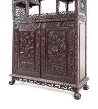 A Chinese Export Hardwood Displaying Cabinet