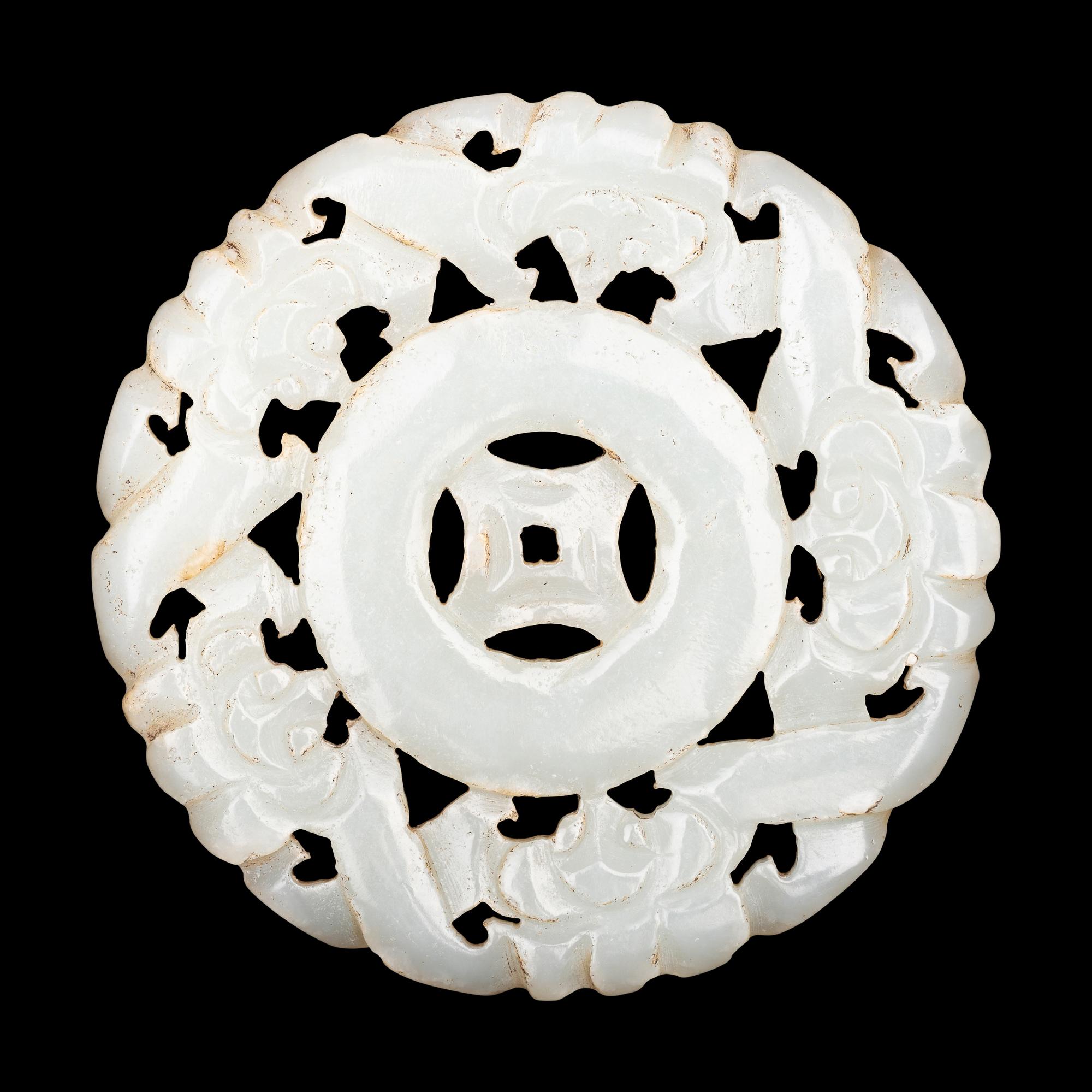 Three Pale Celadon Jade Pendants