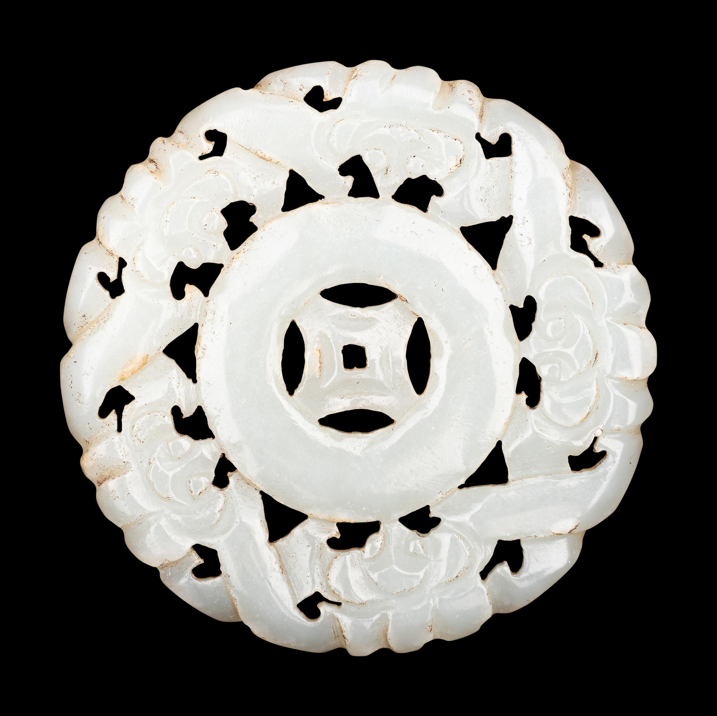 Three Pale Celadon Jade Pendants
