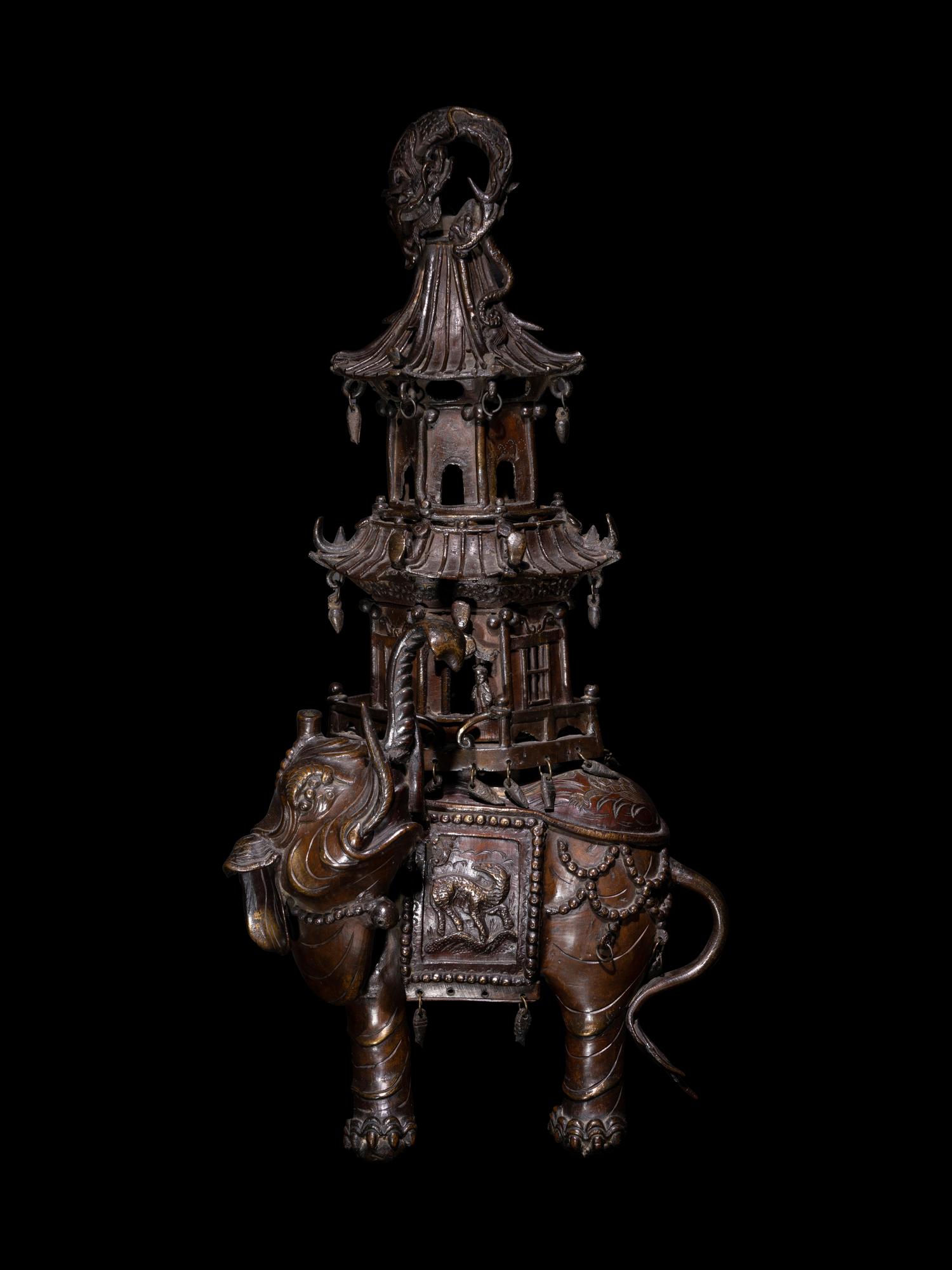 A Chinese Bronze Elephant-Form Incense Burner