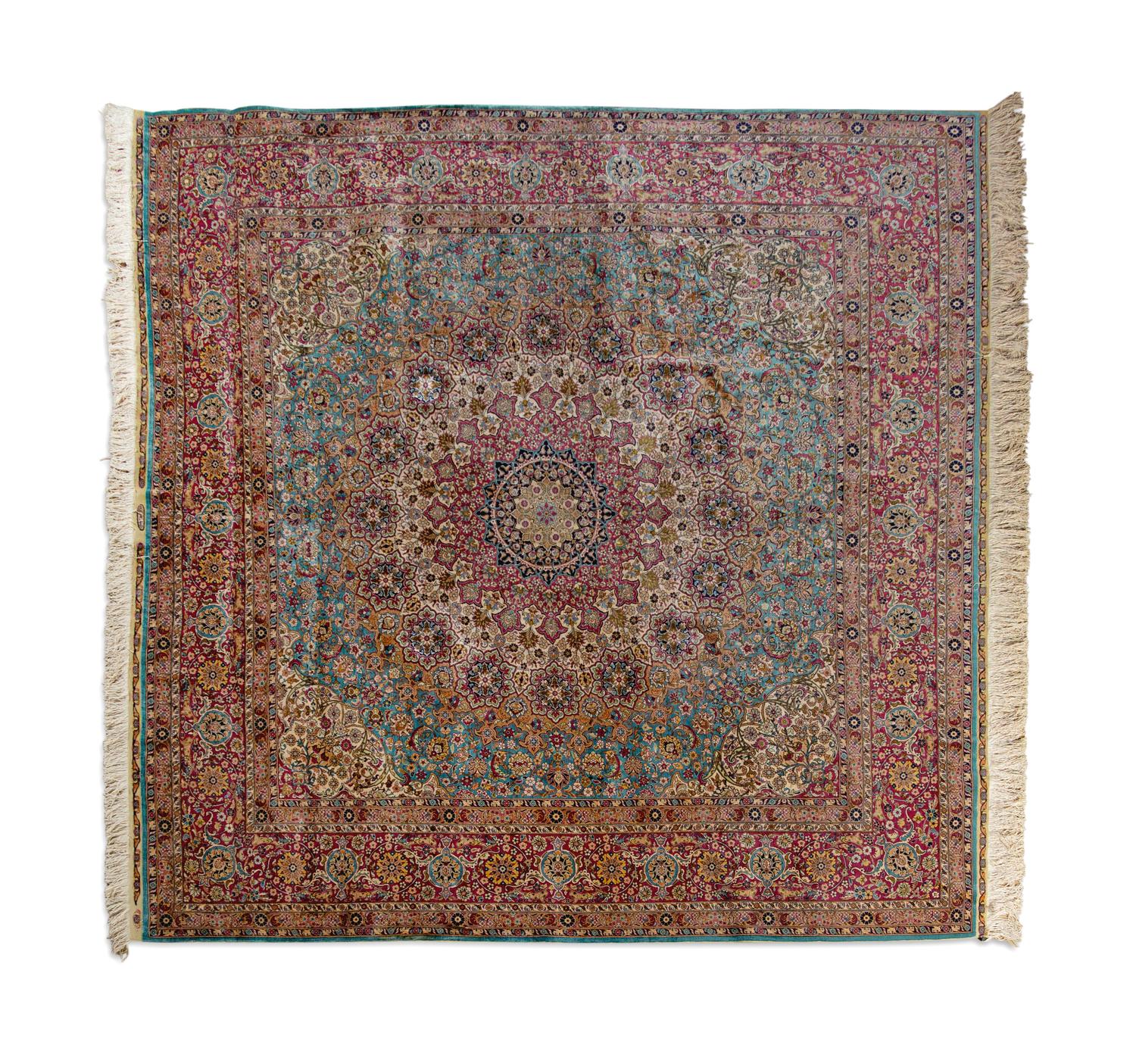 A Persian Silk and Wool Rug