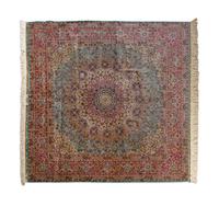 A Persian Silk and Wool Rug