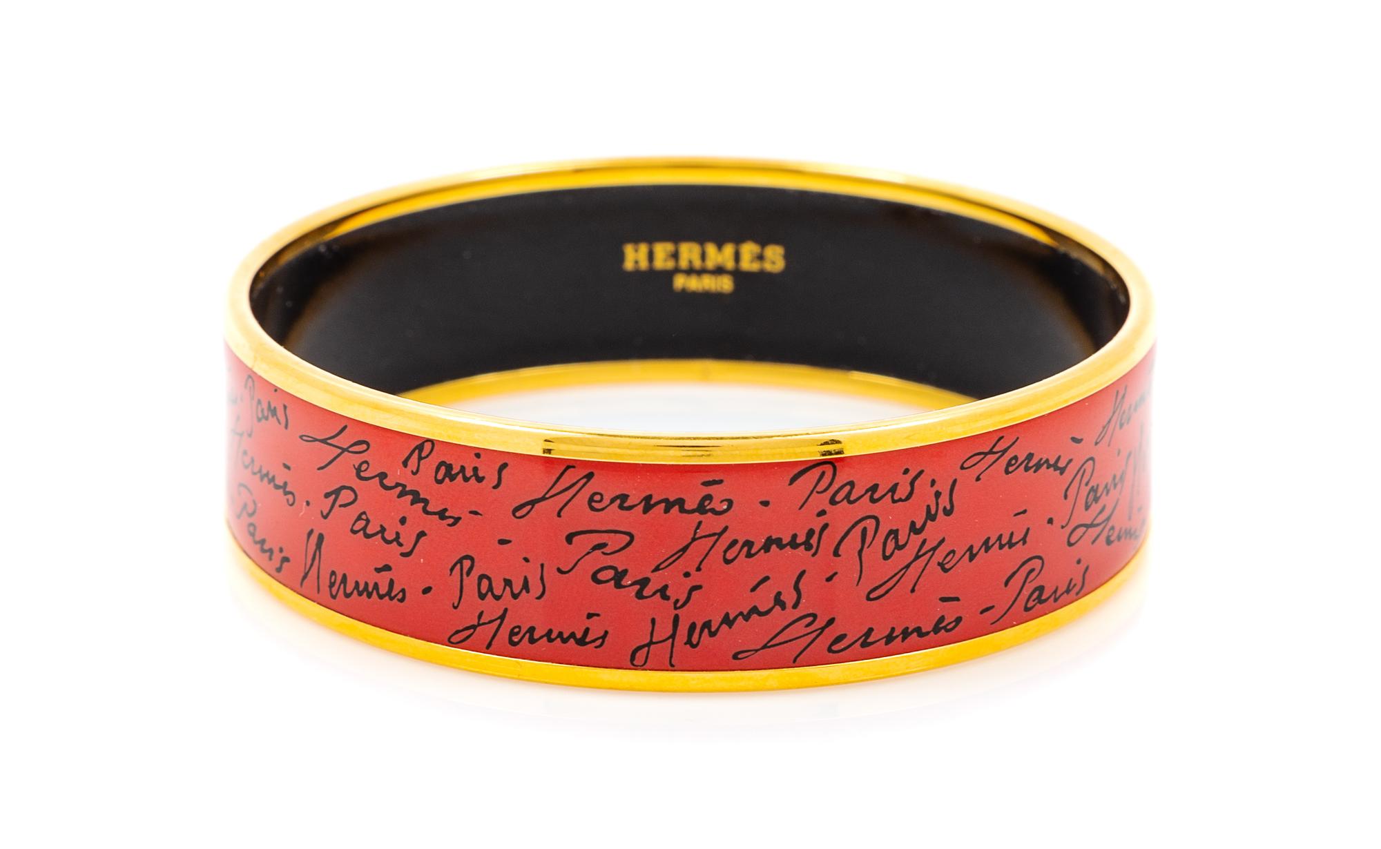 An Hermès Red/Orange Enamel 65mm Bangle, 6.5cm diameter, .75" W.
