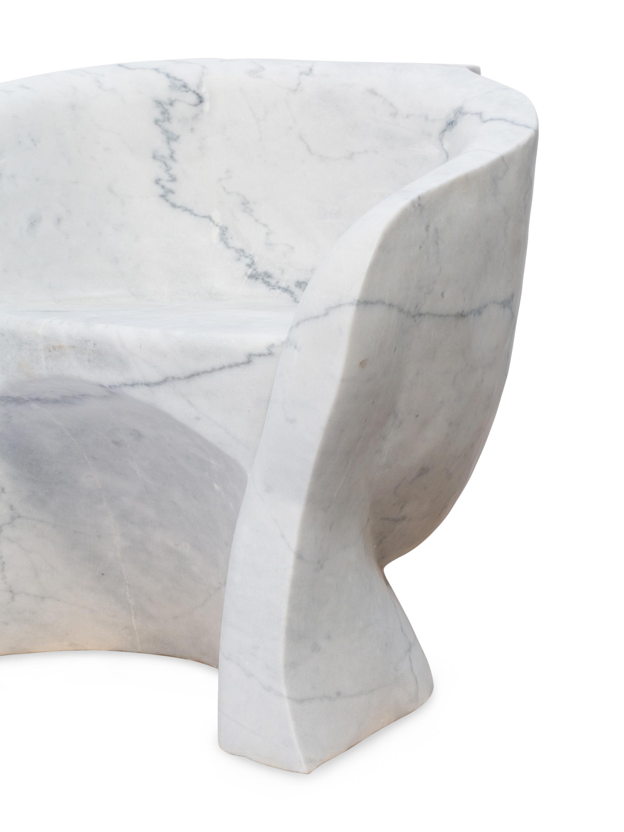 A Pair of Italian Carved White Marble “Face” Chairs