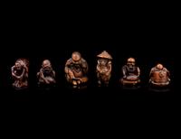 Six Japanese Carved Wood and Bamboo Figural-Form Netsuke