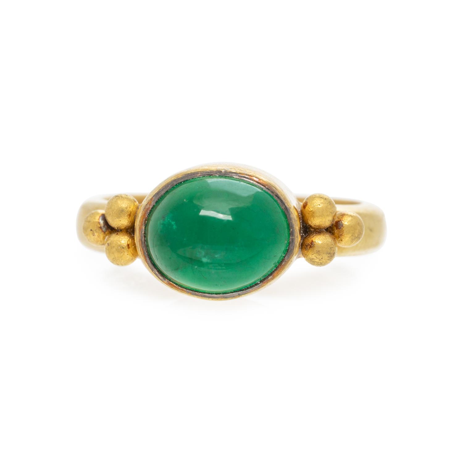 BIKAKIS & JOHNS, HIGH KARAT YELLOW GOLD AND EMERALD RING