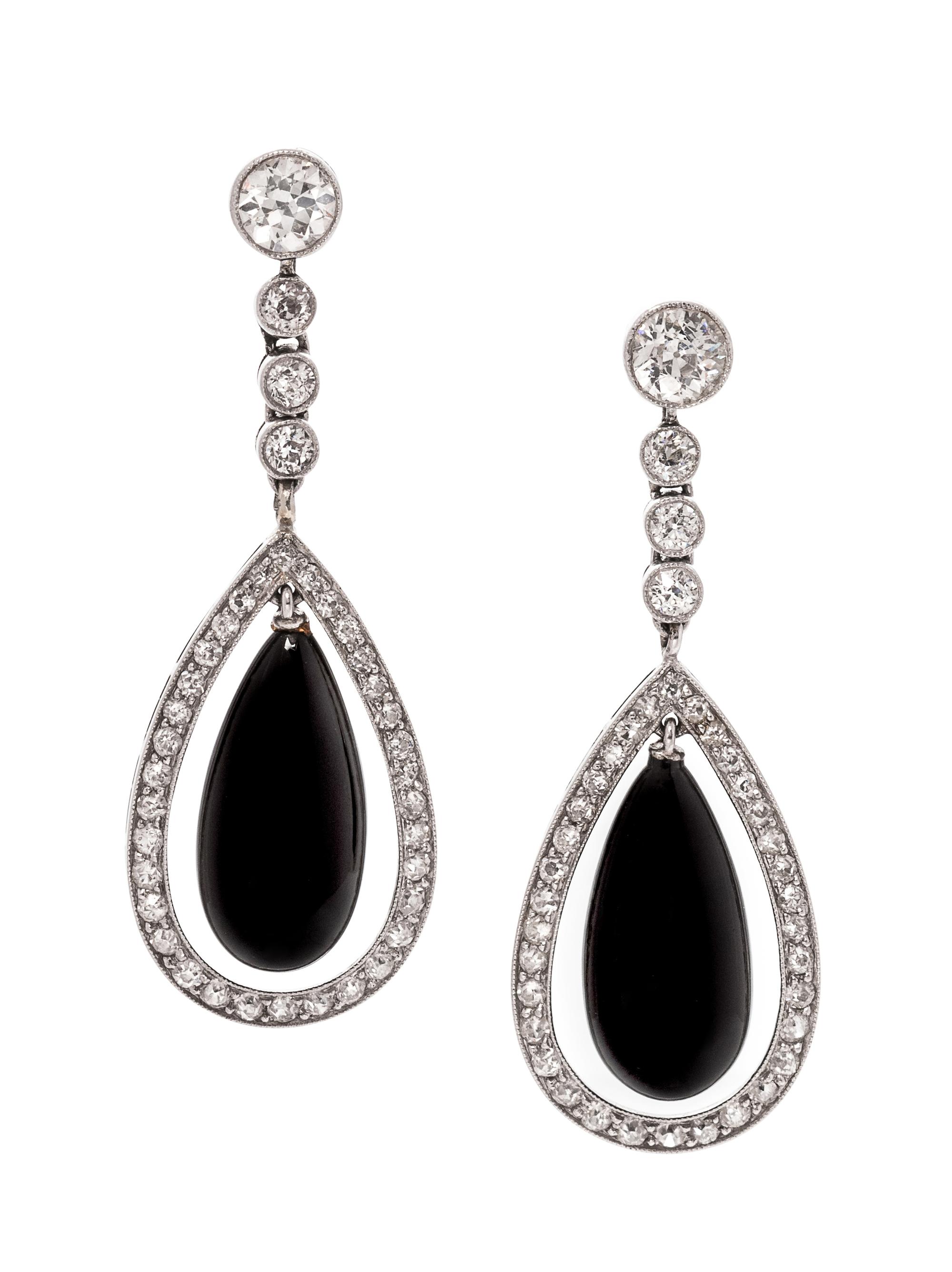 A Pair of Platinum, Diamond and Onyx Pendant Earrings,