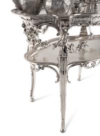 A Rare German Silver Two-Tier Tea Table with Matching Five-Piece Tea Service and Two Trays