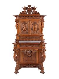 A Renaissance Revival Carved Walnut Cabinet In the Manner of Alexander Roux