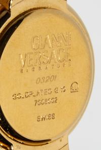 A Gianni Versace Medusa Disc Link Watch, 7.5" X 1.25".