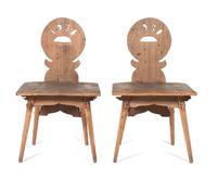 A Pair of Hand Carved Folk Art Chairs Height of each 33 inches. — 1930