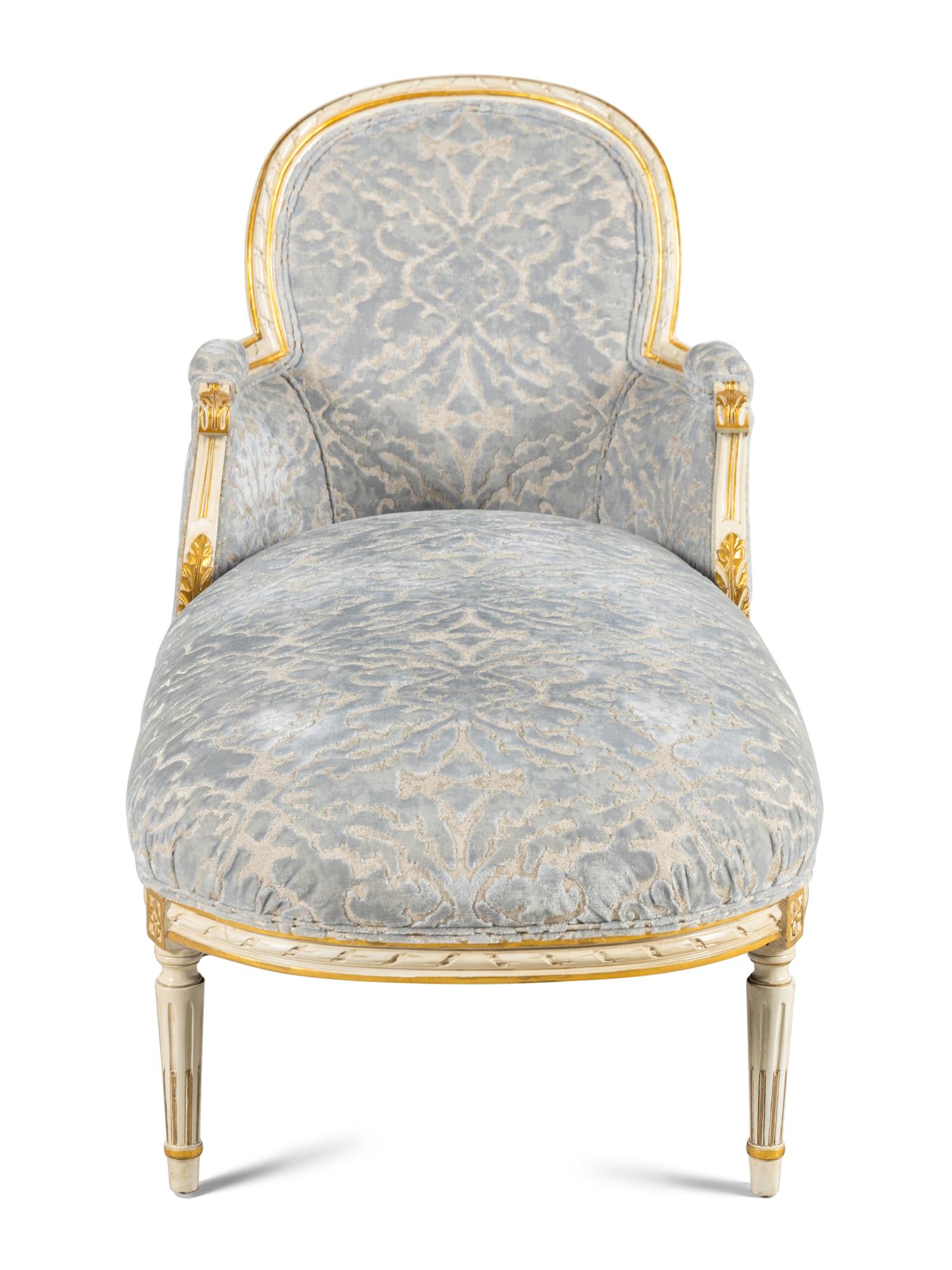 A Louis XVI Style Painted and Parcel-Gilt Chaise Longue