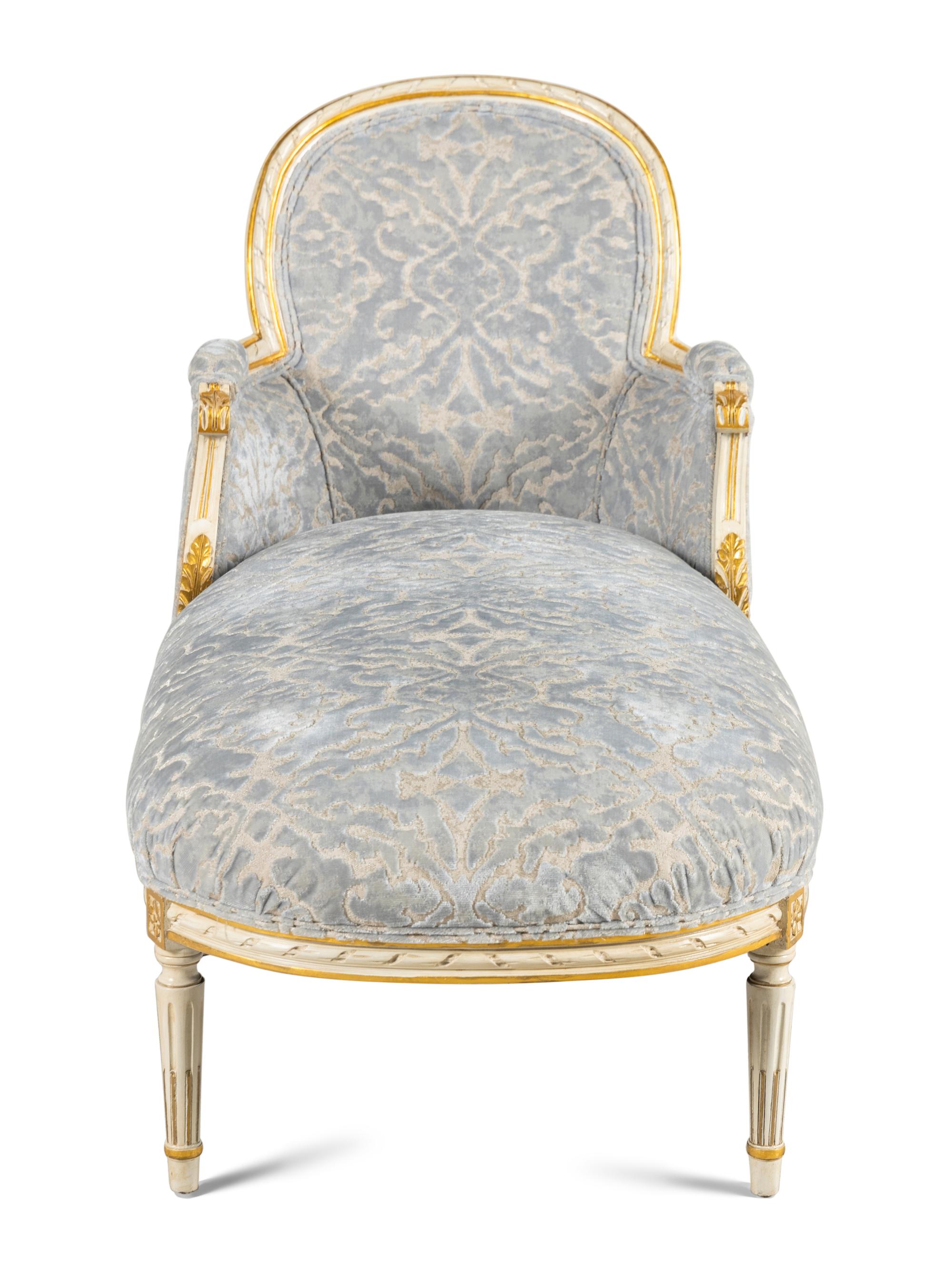 A Louis XVI Style Painted and Parcel-Gilt Chaise Longue