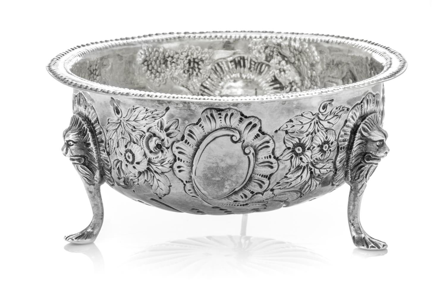 An Irish Victorian Silver Sugar Bowl, John Shields, Dublin, 1893, the beaded rim above the body having repousse pastoral scenes and a v
