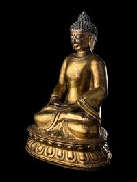 A Large Tibetan Gilt Bronze Figure of Seated Buddha