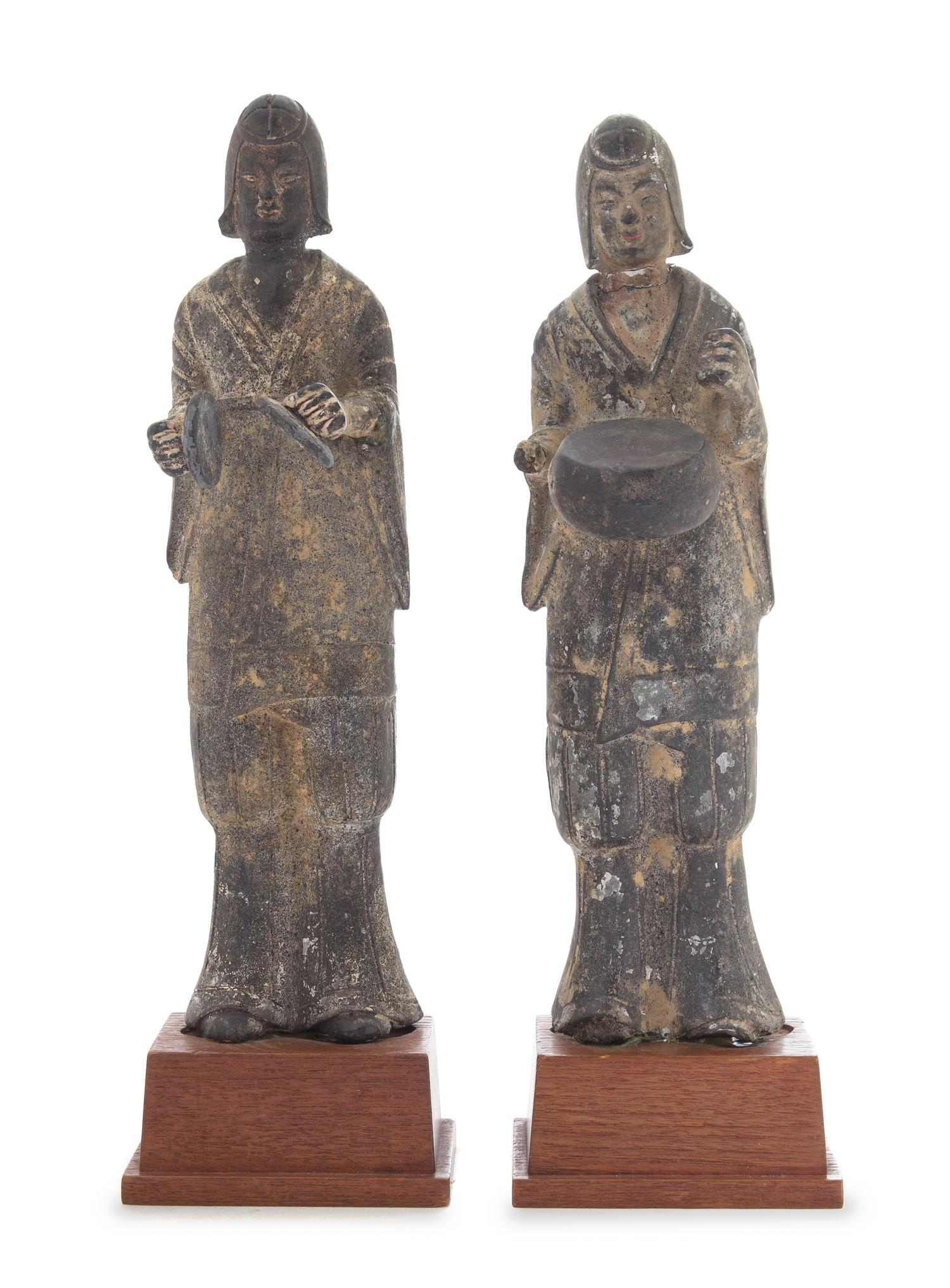 A Pair of Greystone Figures of Musicians Height of taller 11 inches.