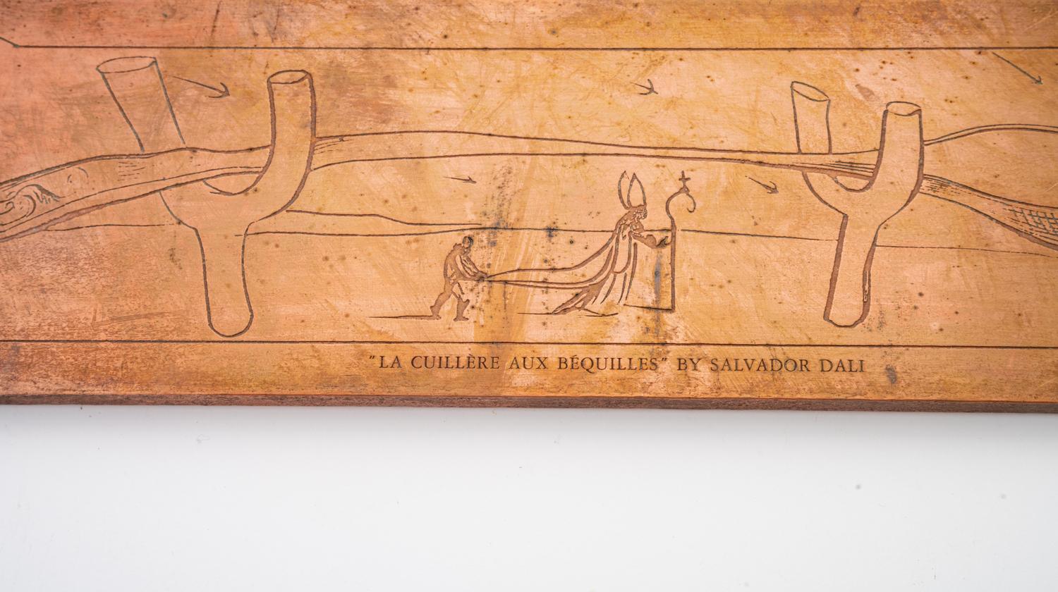 A Bronze Plaque After Salvador Dali (20th Century)