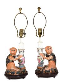 A Pair of Polychromed Ceramic Monkey Lamps Overall height 23 inches. — 20TH CENTURY