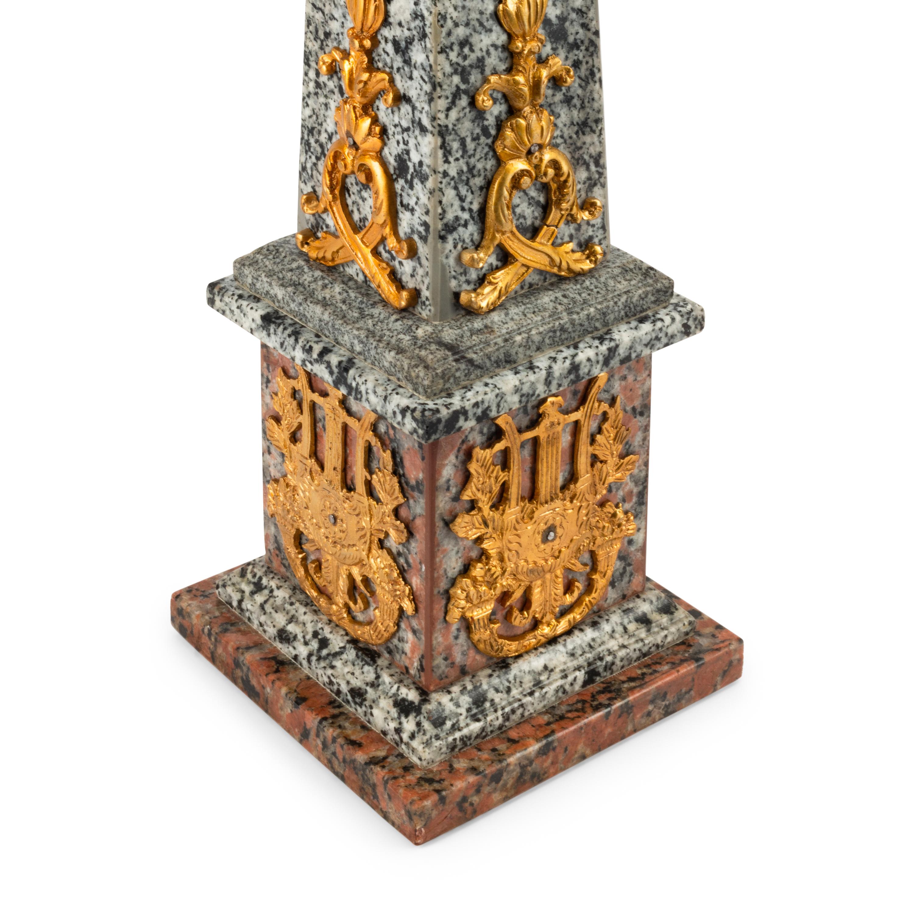 A Pair of Italian Granite and Gilt Bronze Mounted Obelisks