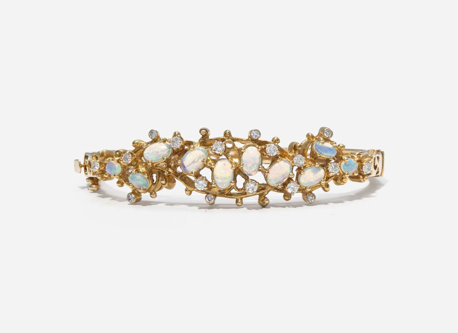 A Collection of 14K Yellow Gold, Opal, and Diamond Jewelry