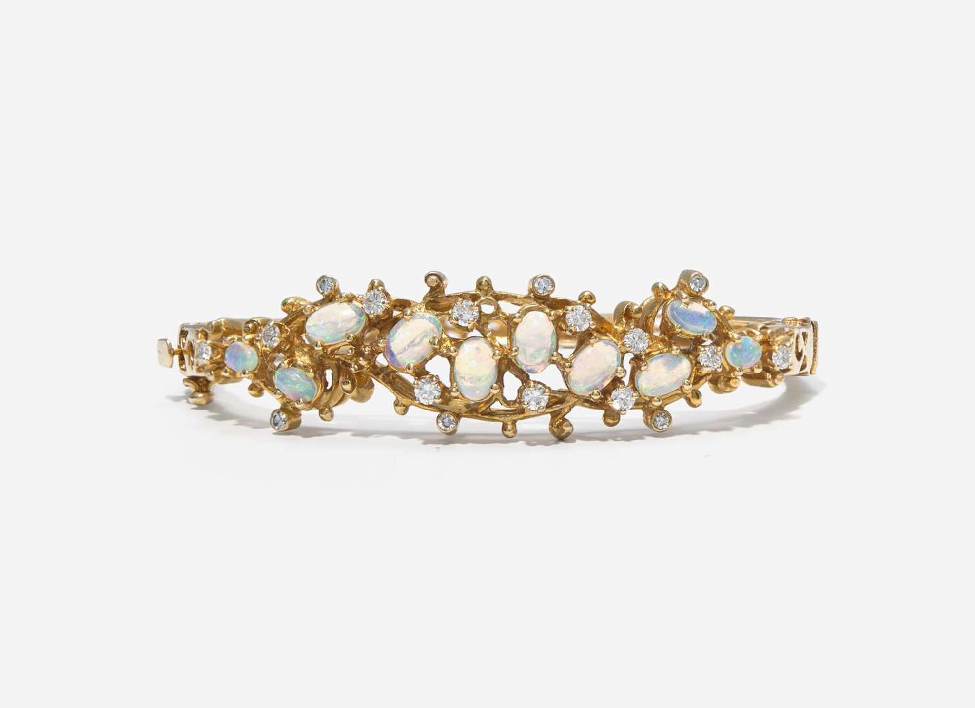 A Collection of 14K Yellow Gold, Opal, and Diamond Jewelry