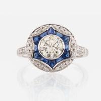 A diamond, sapphire, and white gold ring