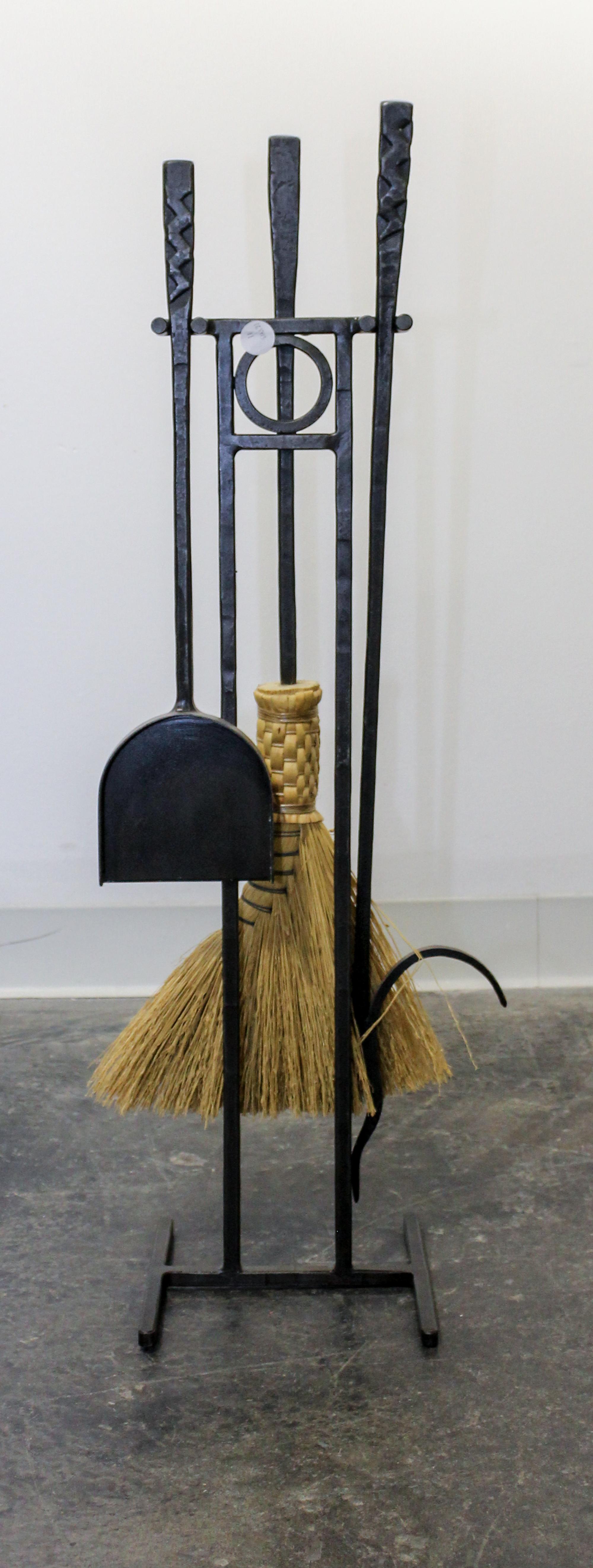 A Cast Iron Fireplace Tool Set Height 34 3/4 inches.