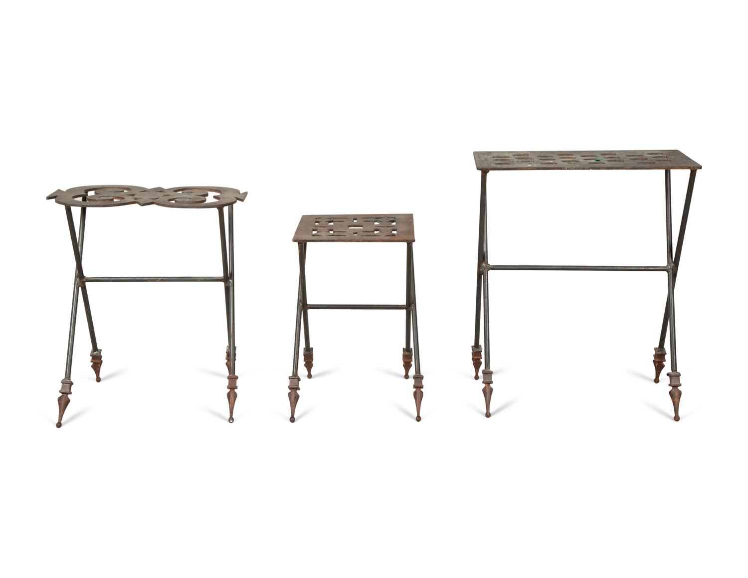 A Set of Three Cut-Out Metal Nesting Tables