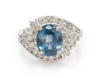 A 14 Karat White Gold, Sapphire and Diamond Ring, 4.40 dwts.