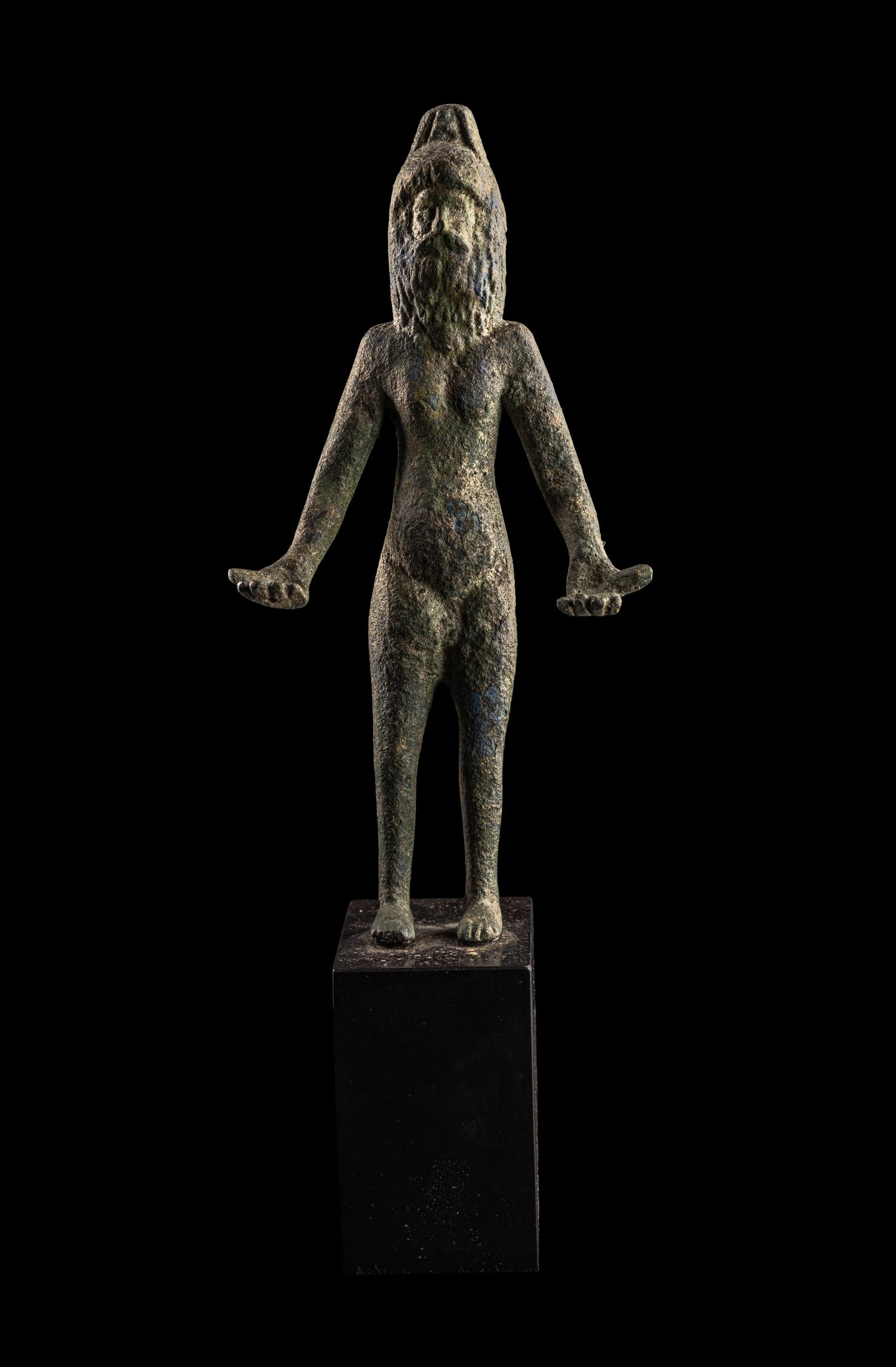 An Etruscan Bronze Female Figure Wearing a Theater Mask