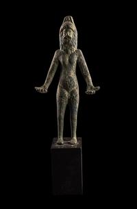 An Etruscan Bronze Female Figure Wearing a Theater Mask