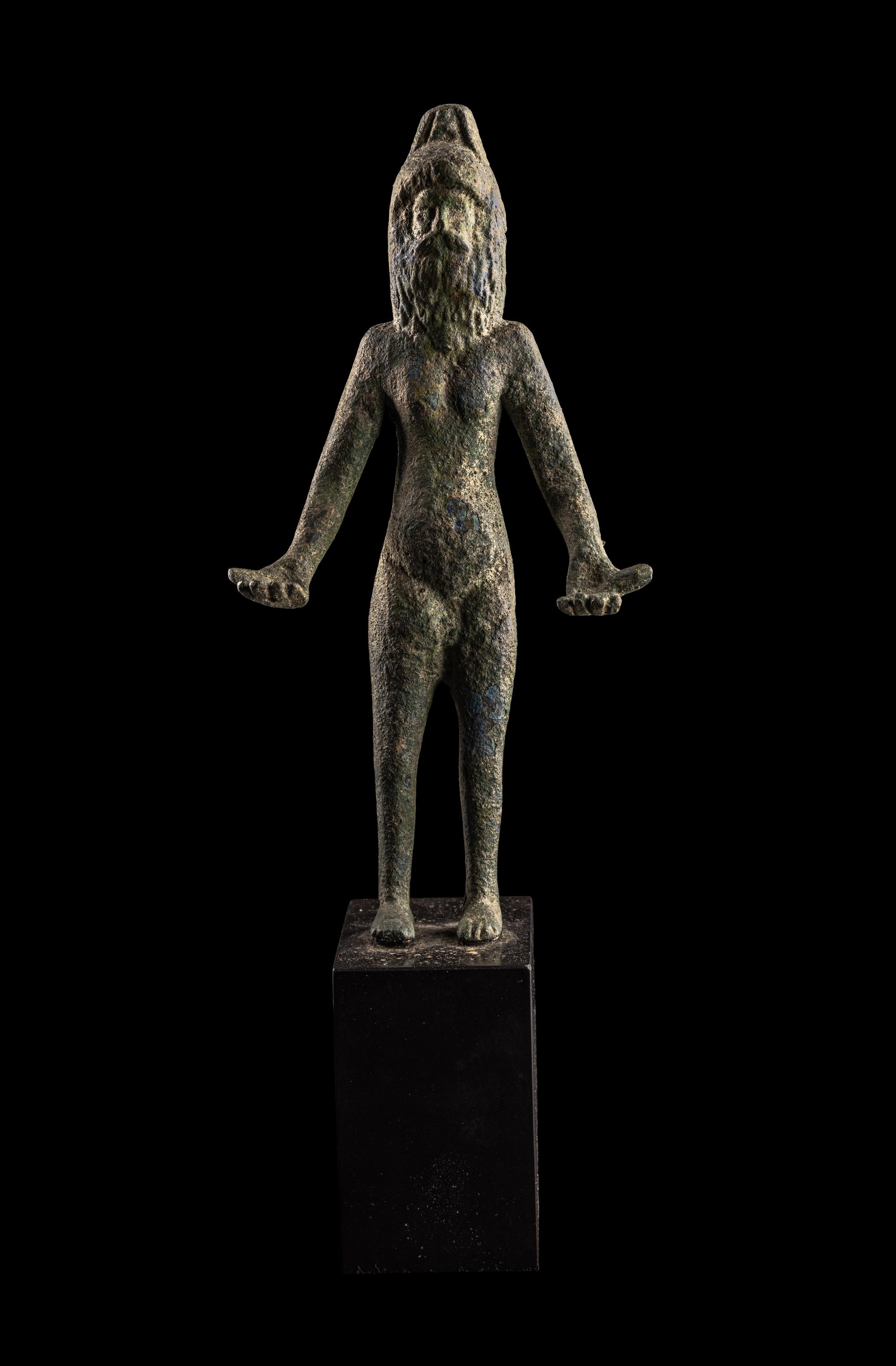 An Etruscan Bronze Female Figure Wearing a Theater Mask