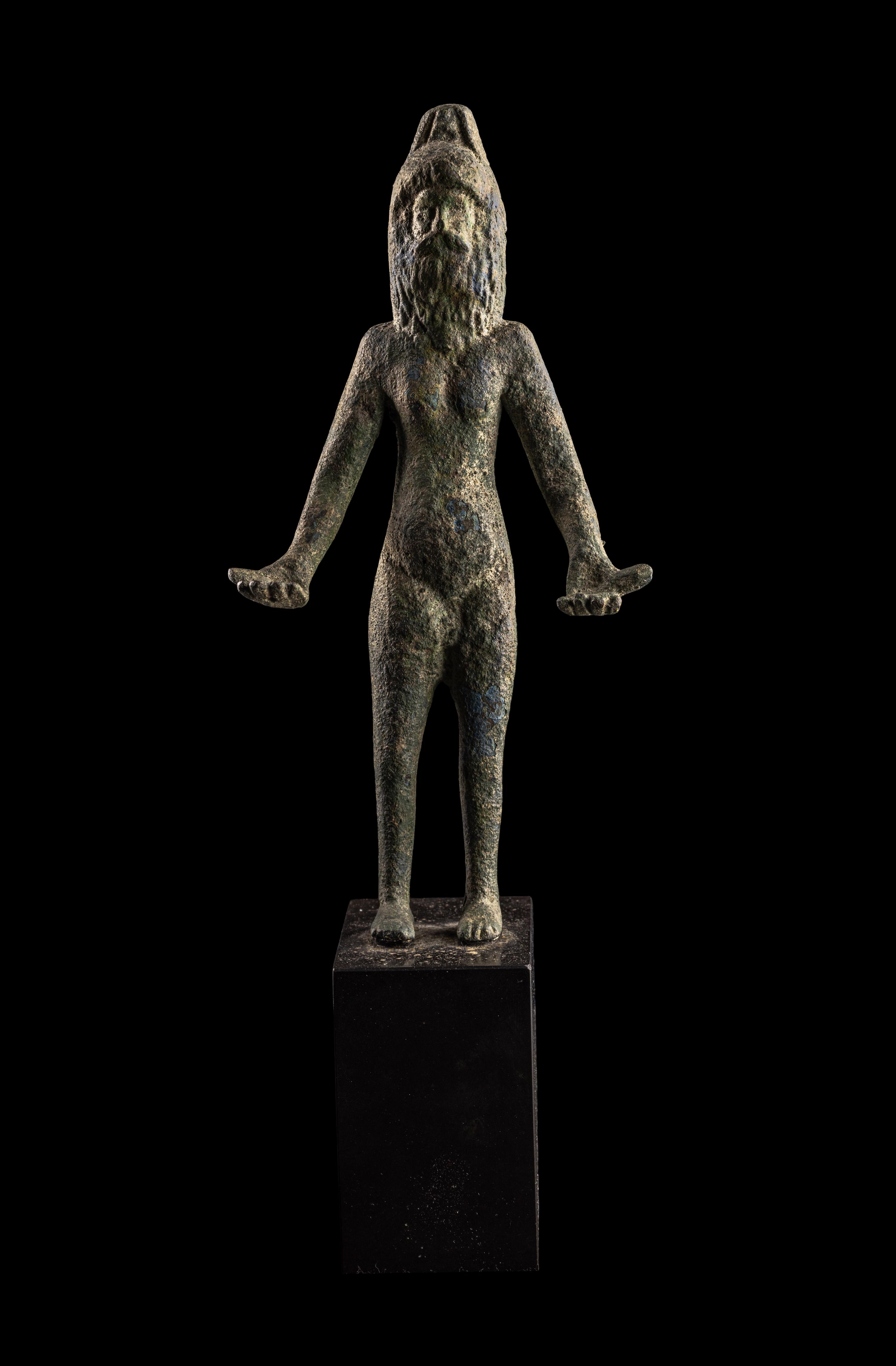 An Etruscan Bronze Female Figure Wearing a Theater Mask